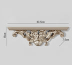Ornamental wall shelf